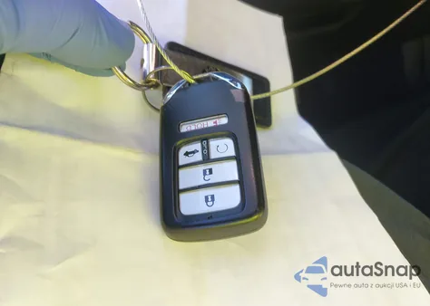 2019 Honda Civic Touring z USA, uszkodzony, nr VIN 19XFC1F93KE201639